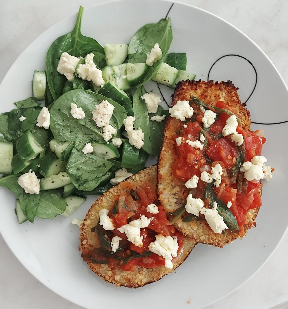 Baked Eggplant with Tomato Sauce and Feta, served with Spinach and Cucumber Salad