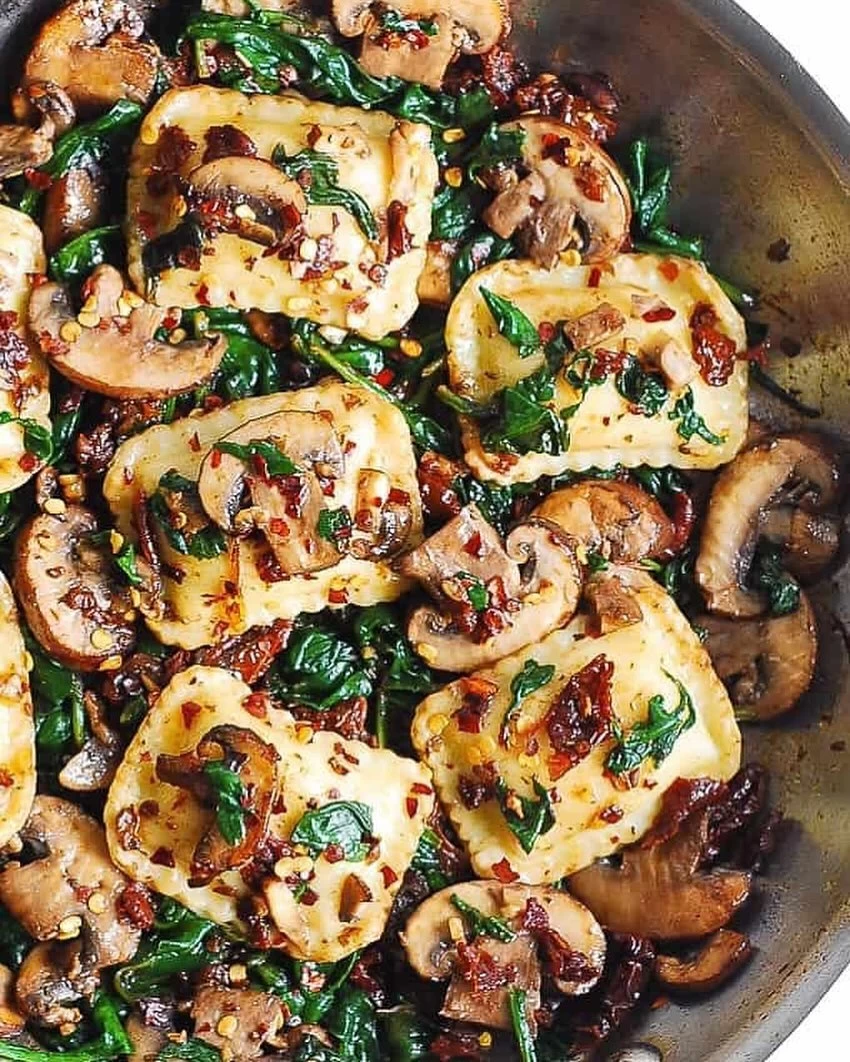 Spinach and Mushroom Ravioli with Sun-Dried Tomatoes and Garlic